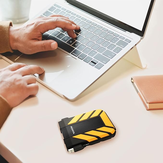 ADATA HD710 Pro - 2 TB External Hard Drive - Shockproof, Waterproof & Dustproof - Durable Storage - For Gamers, Students & Professionals - Mac, PC & Linux Compatible - Yellow - AHD710P-2TU31-CYL