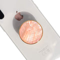 On The Grip Universal Phone Grip & Stand, Genuine Natural Gemstone/Seashell, Strong Adhesive Finger Holder, Collapsible Socket for iPhone, Samsung Galaxy, Kindle and Tablets (Peach)