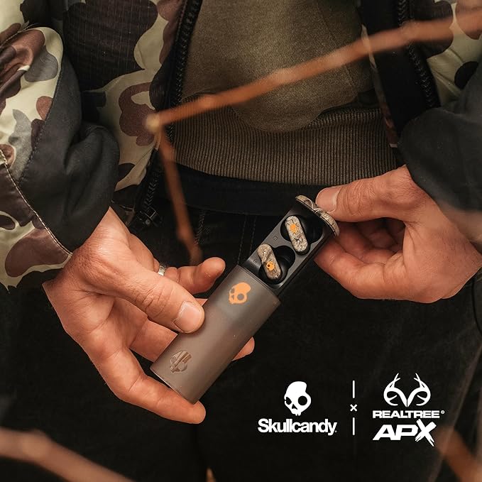Skullcandy Dime Evo Wireless Earbuds, Bluetooth Headphones, Noise Isolating Fit, Up to 36 Hours Battery, Microphone, Easy Carry with Clip-Anywhere Case - Realtree APX Black/Orange